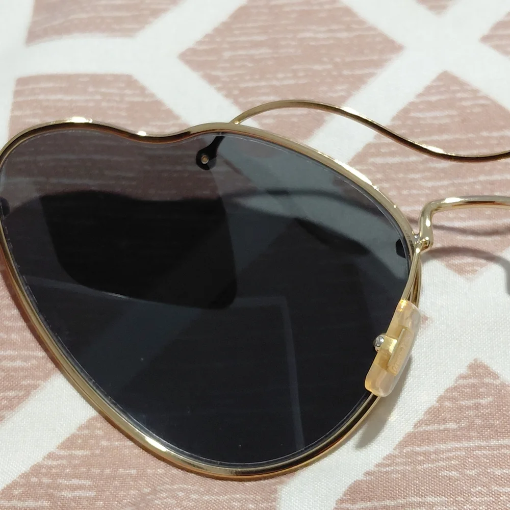 Miu Miu Gold Frame Sunglasses with Black Lenses